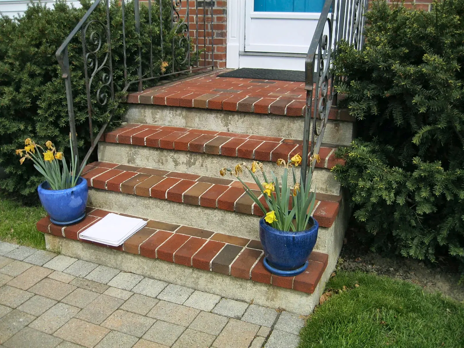 Granite and stone veneer front steps by Gerrior Masonry