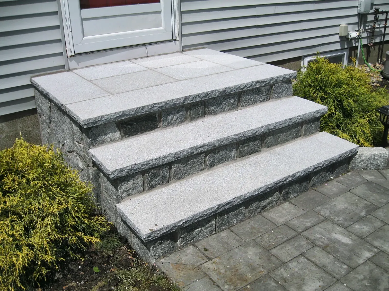 Front steps and paver walkway by Gerrior Masonry