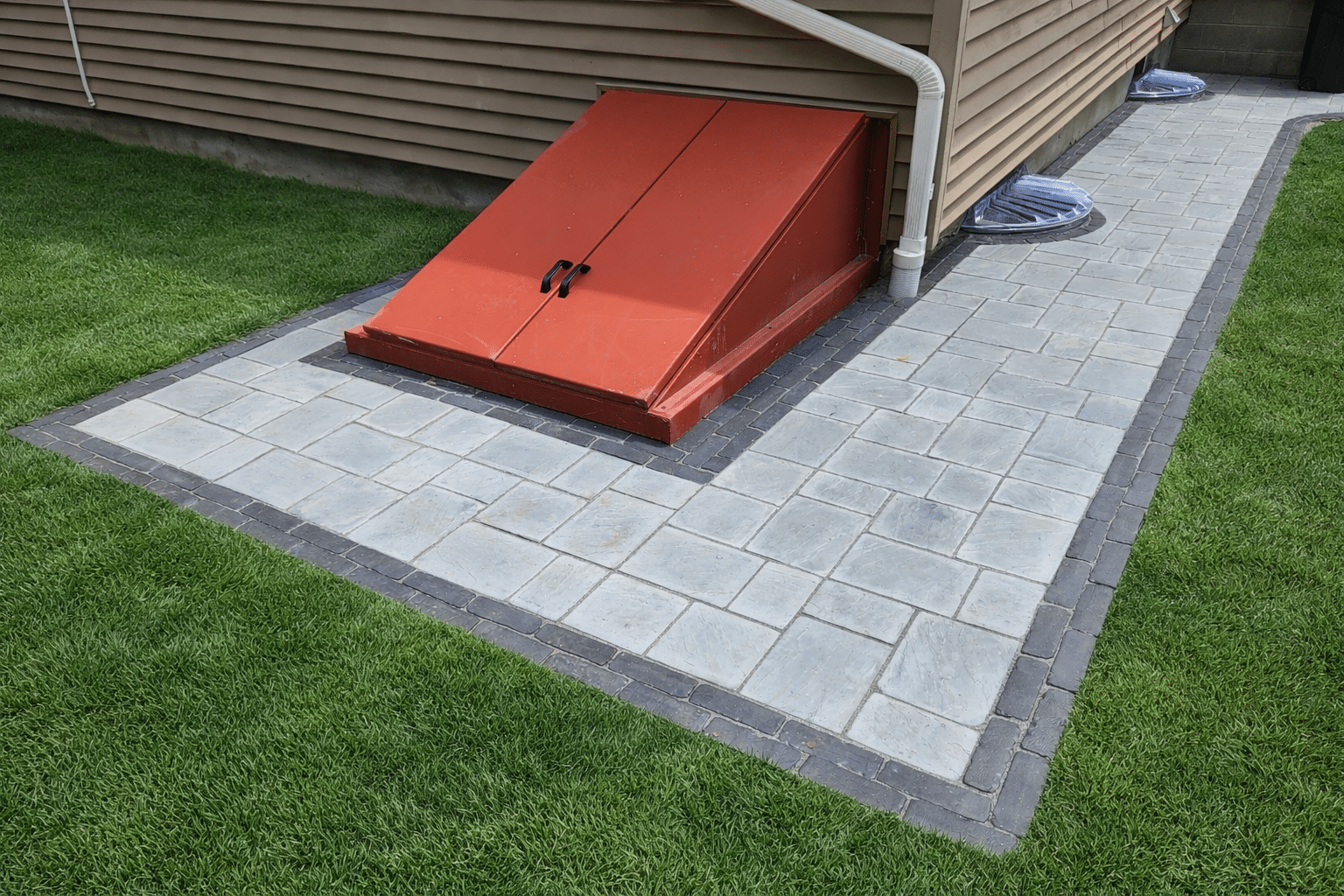 Suburban house exterior with vibrant driveway